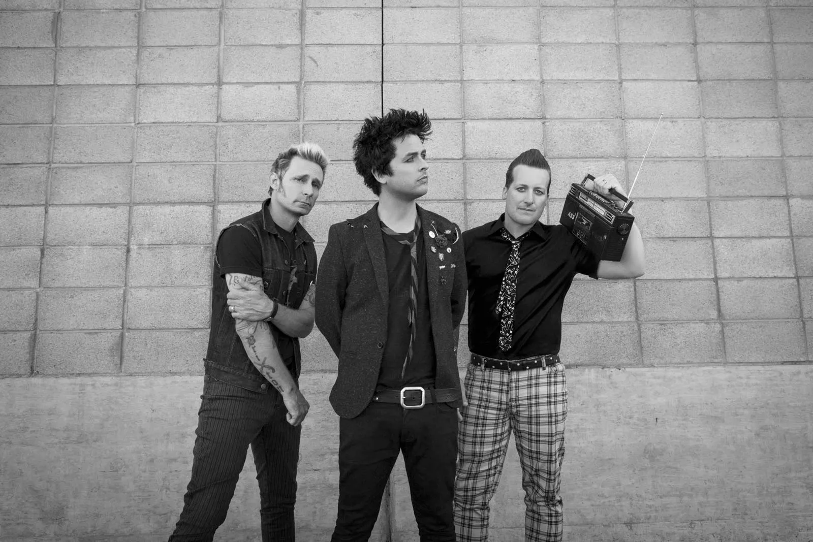 Green Day band group photo, ideal for an article about easy Green Day guitar songs for beginners.